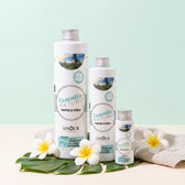 Essentia Nature laundry perfume Bali with plumeria flowers